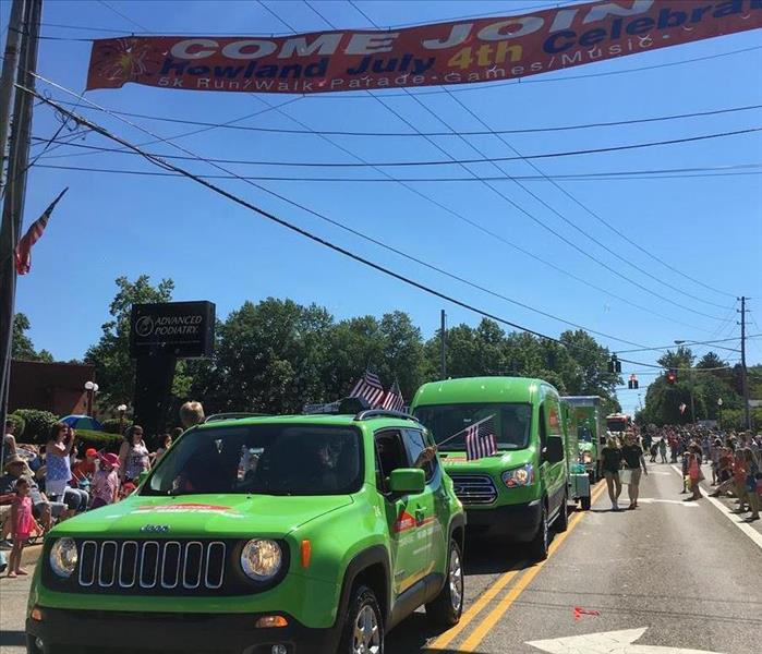 SERVPRO vehicles drive by in parade